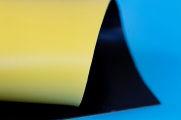 Yellow and black colored PVC membrane membrane Close-up, selected focus..