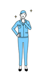 自信家のポーズを取る作業着を着たシニア女性（経営者、管理職、工場長）