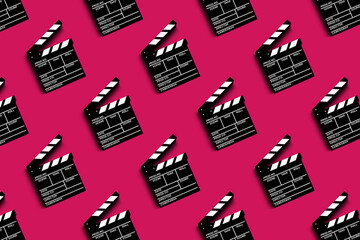 clapper board for shooting video and movies pattern on magenta background