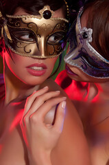 Obraz na płótnie Canvas woman with colorful carnival mask