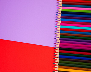 multi-colored pencils on multi-colored background, Close up, copy space, Modern art. Modern design