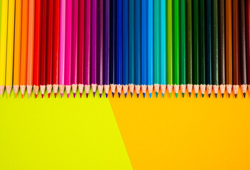 multi-colored pencils on multi-colored background, Close up, copy space, Modern art. Modern design