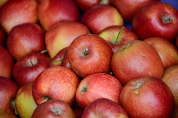 beautiful red apples in a market stand