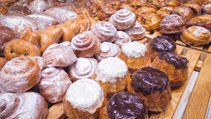 Sweet buns on bakery shop showcase