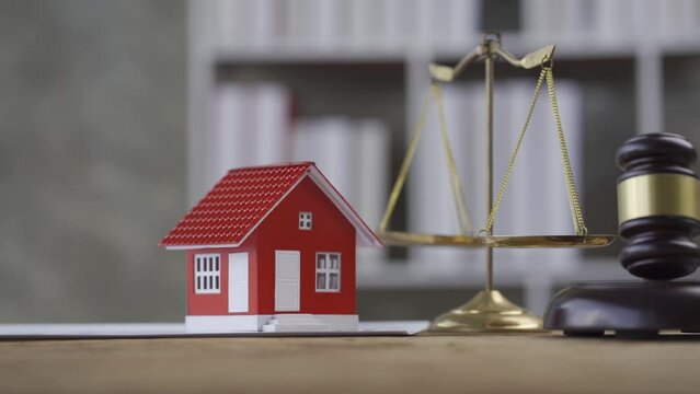Legal auction. Judge hammers luxury homes. homeowner concept
Lawyer property auction of home real estate and ownership concept