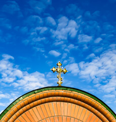 Christian church cross in high steeple tower for prayer