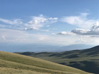 Landscape with mountains and clouds