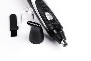 Nose and ear hair removal trimmer, men's electric razor close-up isolated on white background