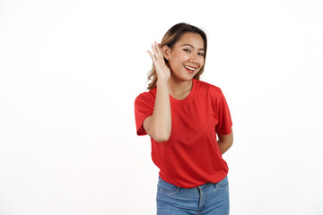 Obraz na płótnie Canvas Studio shot of pretty Asian woman with red t-shirt isolated on white background. Hear