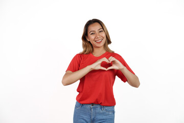 Studio shot of pretty Asian woman with red t-shirt isolated on white background. Heart shape