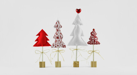 Handmade Creative Christmas trees on wooden sticks with white background