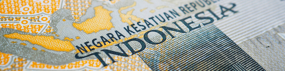 Translation: Unitary state of Republic of Indonesia. Fragment of 2000 rupiah bill. Banner about...
