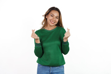 Obraz na płótnie Canvas Attractive beautiful asian woman in green sweater isolated on white background. Mini heart