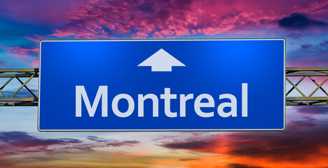 Road sign indicating direction to the city of Montreal