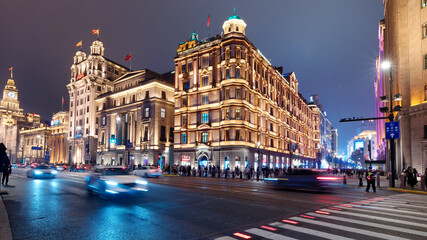 night view of shanghai bund historical landmark buildings, long time exposure. - obrazy, fototapety, plakaty