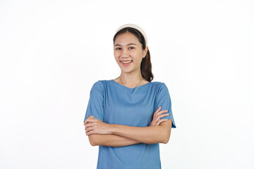 Beautiful Asian woman in blue t-shirt isolated on white background. Looking camera