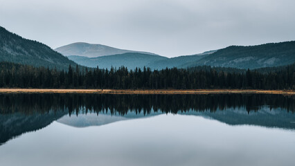 Lake in the mountains with reflection - obrazy, fototapety, plakaty