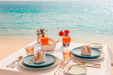 Luxury breakfast table beautiful tropical sea sky background. Idyllic romantic morning love couples time at summer holiday. Honeymoon romance vacation concept. Travel and lifestyle, destination dining © icemanphotos