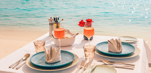 Luxury breakfast table beautiful tropical sea sky background. Idyllic romantic morning love couples time at summer holiday. Honeymoon romance vacation concept. Travel and lifestyle, destination dining