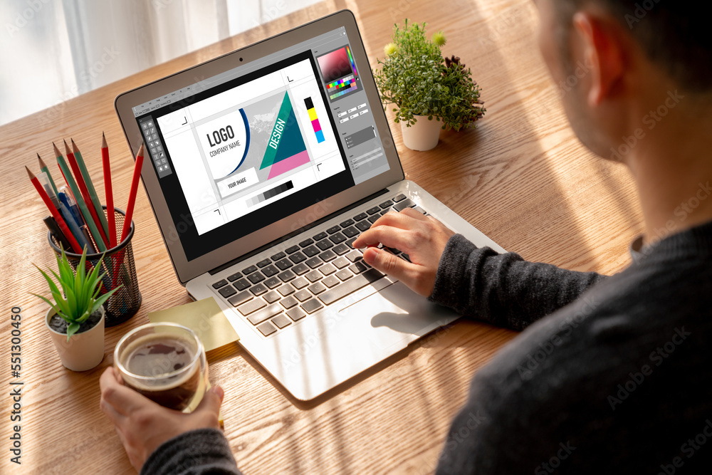 Aufkleber graphic designer software for modern design of web page and commercial ads showing on the computer s