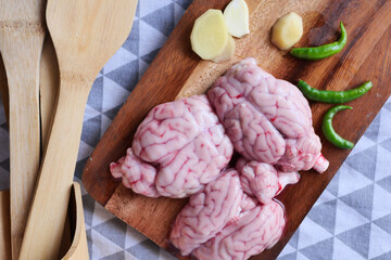 close up of mutton brain on a chopping board 