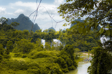 Surrounded by picturesque karst peaks (more famously present in places like Guilin (China),...