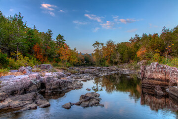 A pristine spot along Marble Creek as it cascades thought a marble outcrop at dusk  in Madison County Missouri. 
