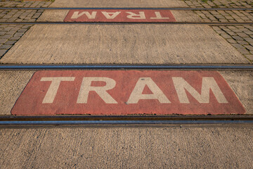 A designated public crossing accross the tram route in Antwerp Belgium is marked clearly to assist...