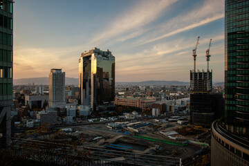 Sunset behind Umeda Sky Building in downtown Osaka