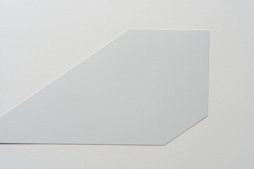 cut medium gray card stock shapes on blank paper
