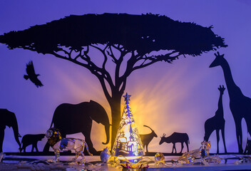 Christmas African Safari Wall Decor, with elephants, antelope and giraffe next to an Acacia tree,...