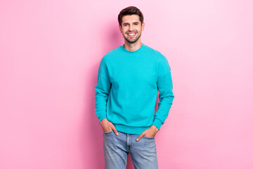 Photo of young cheerful satisfied good mood guy student wear blue sweater smiling wear stylish outfit promo isolated on pink color background