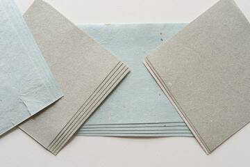 neutral paper squares on blank paper