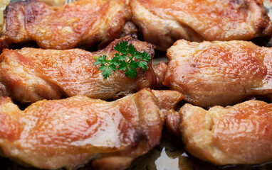 fried chicken meat with appetizing skin in oil