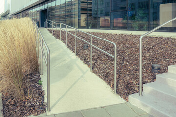 Modern design urban garden landscaping. Majestic ornamental feather reed grass and concrete...