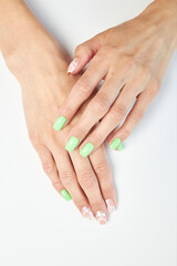 female manicure on a white background. nail. nails. Women's hands with a beautiful manicure on a white background. Beautiful female hands on a light background. Take care of your hand.