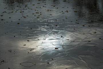 This is how the river freezes.  
As the air temperature drops, ice forms on the surface of the water.  
