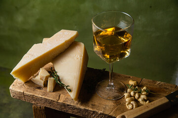 Parmesan cheese on a dark background close-up
