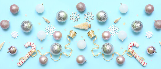 Composition with stylish Christmas decorations on blue background, top view