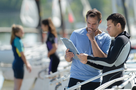 a sports teacher with student