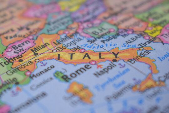 Italy Travel Concept Country Name On The Political World Map Very Macro Close-Up View Stock Photograph