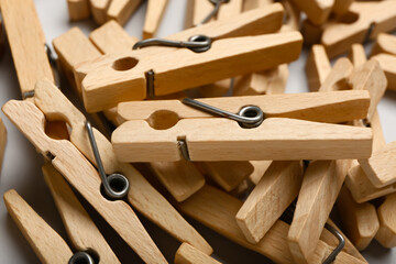 Heap of wooden clothespins, closeup