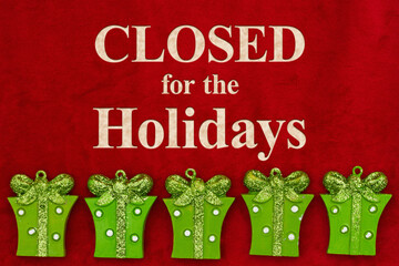 Closed for the Holidays message with green Christmas presents