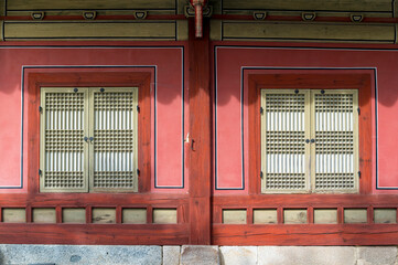 Architectural detail - Korean Tradition Wooden Window, decoration brick wall from ancient korean house in Seoul, South Korea