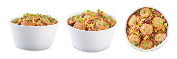 Kidney beans tomato paste sausage rice stew in a bowl on a white isolated background