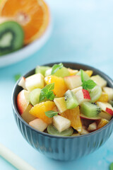 Fototapeta na wymiar A bowl with fresh fruit salad