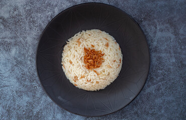 Traditional delicious Turkish food; Turkish style rice pilaf (Turkish name; Arpa sehriyeli pirinc pilavi)
