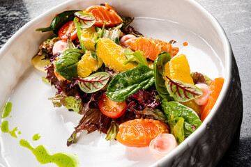 salad with  orange and salmon