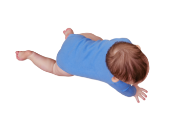 Happy baby toddler crawls on a wooden laminate, isolated on a white background. Funny child on the parquet in the home living room
