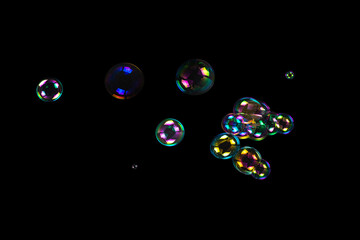 Soap bubbles isolated on a black background.